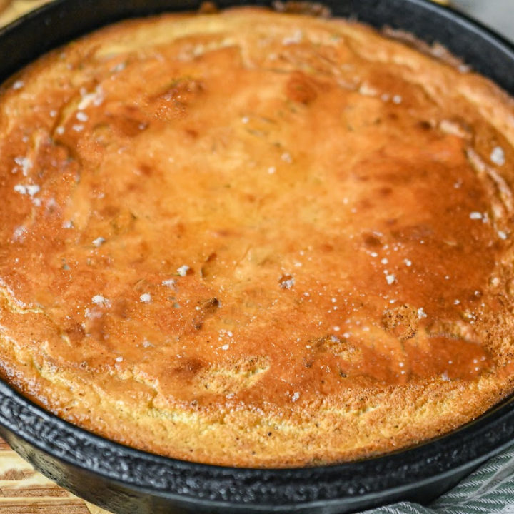 easy keto olive oil cornbread baked in a cast iron skillet
