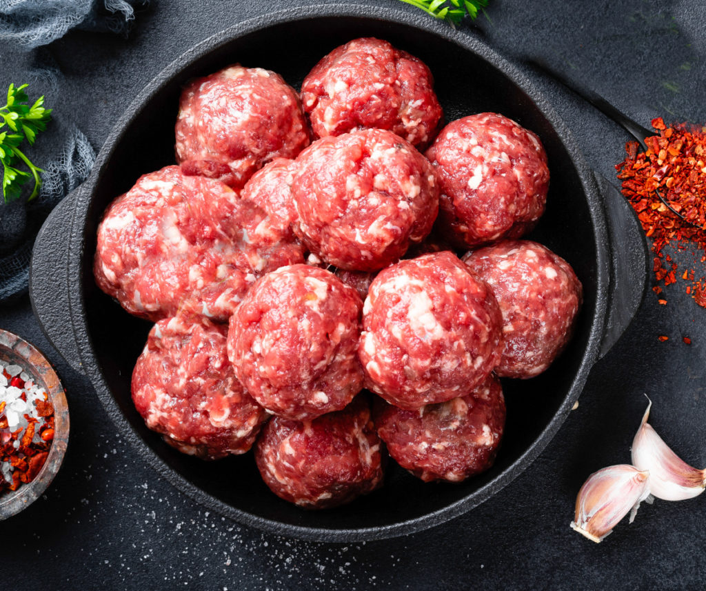 Raw meatballs ready to be baked