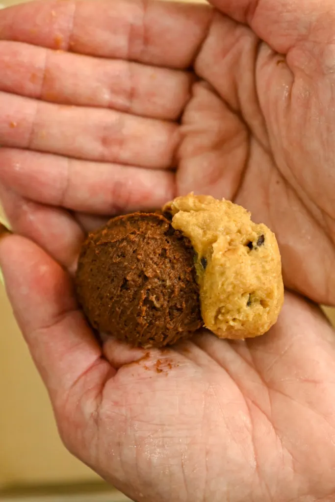 Using wet hands to form the cookies to prevent them from sticking to your hands