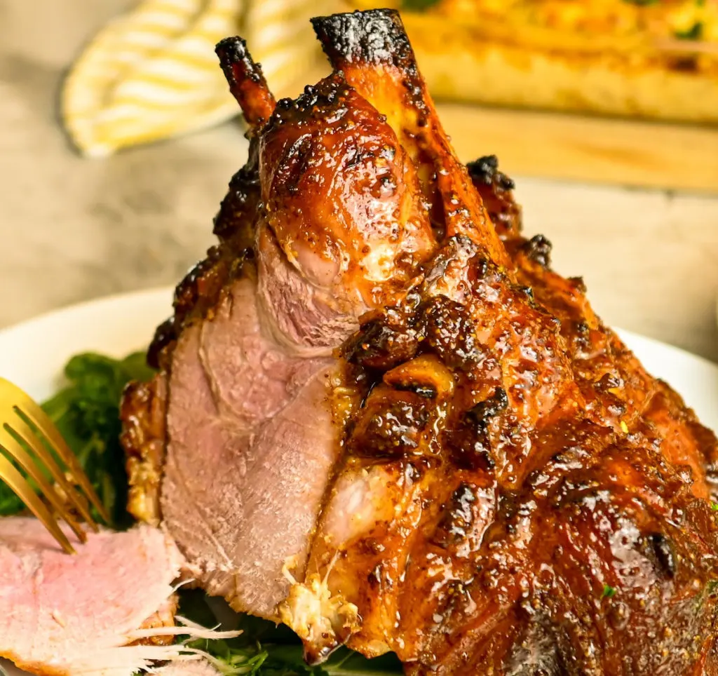 keto brown sugar mustard glazed ham being sliced