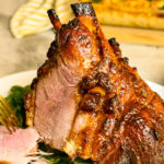 keto brown sugar mustard glazed ham being sliced