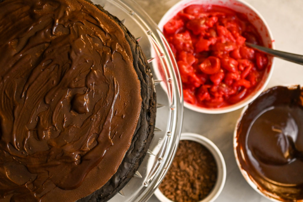 Chocolate keto cheesecake ready for black forest toppings