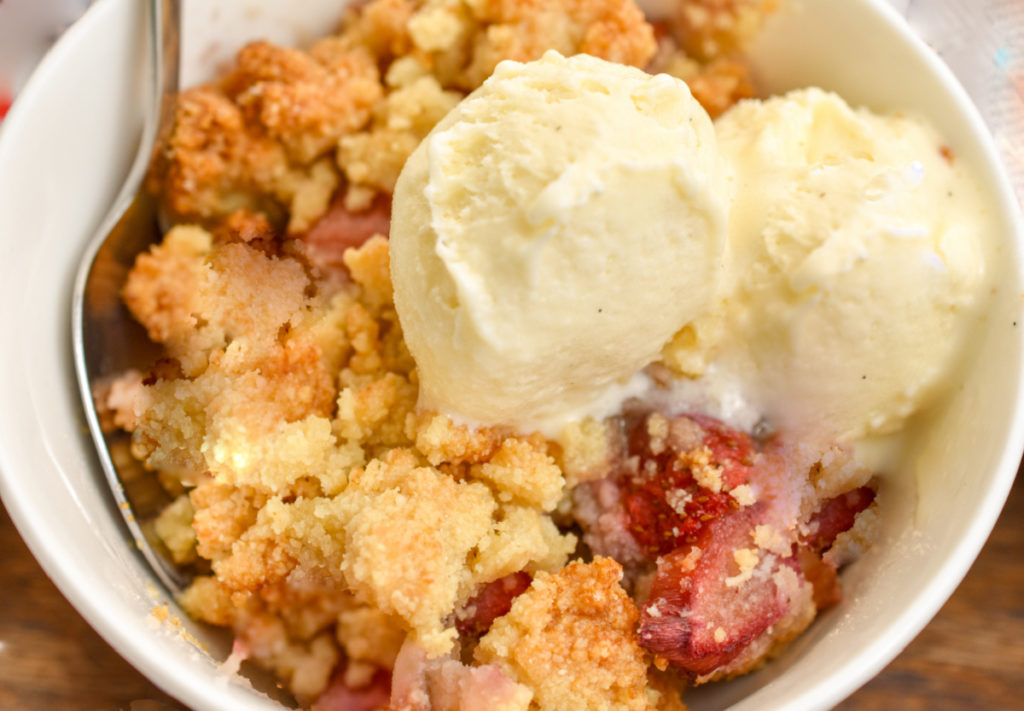 Keto strawberry cobbler served with keto vanilla ice cream