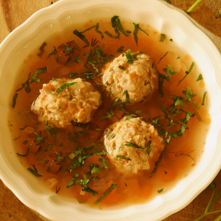 keto meatball soup served in a white bowl
