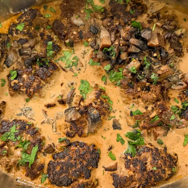 keto salisbury steak served in a stainless steel container