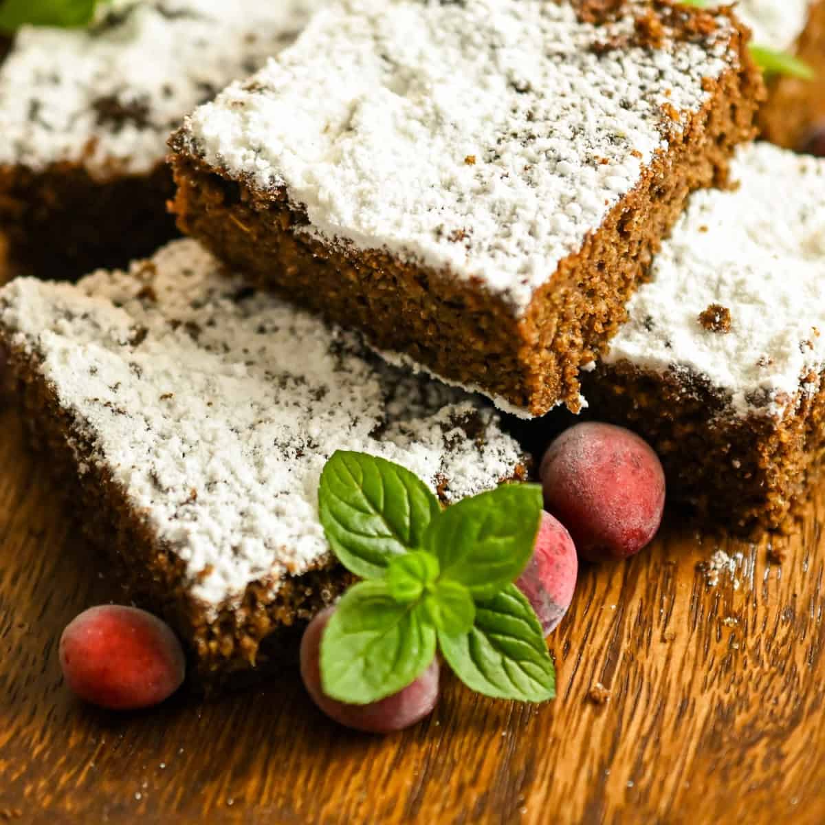 keto gingerbread cake slices on a wooden board 1200