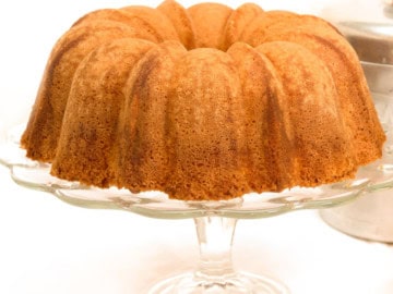 keto sour cream pound cake on a cake pedestal stand 1200