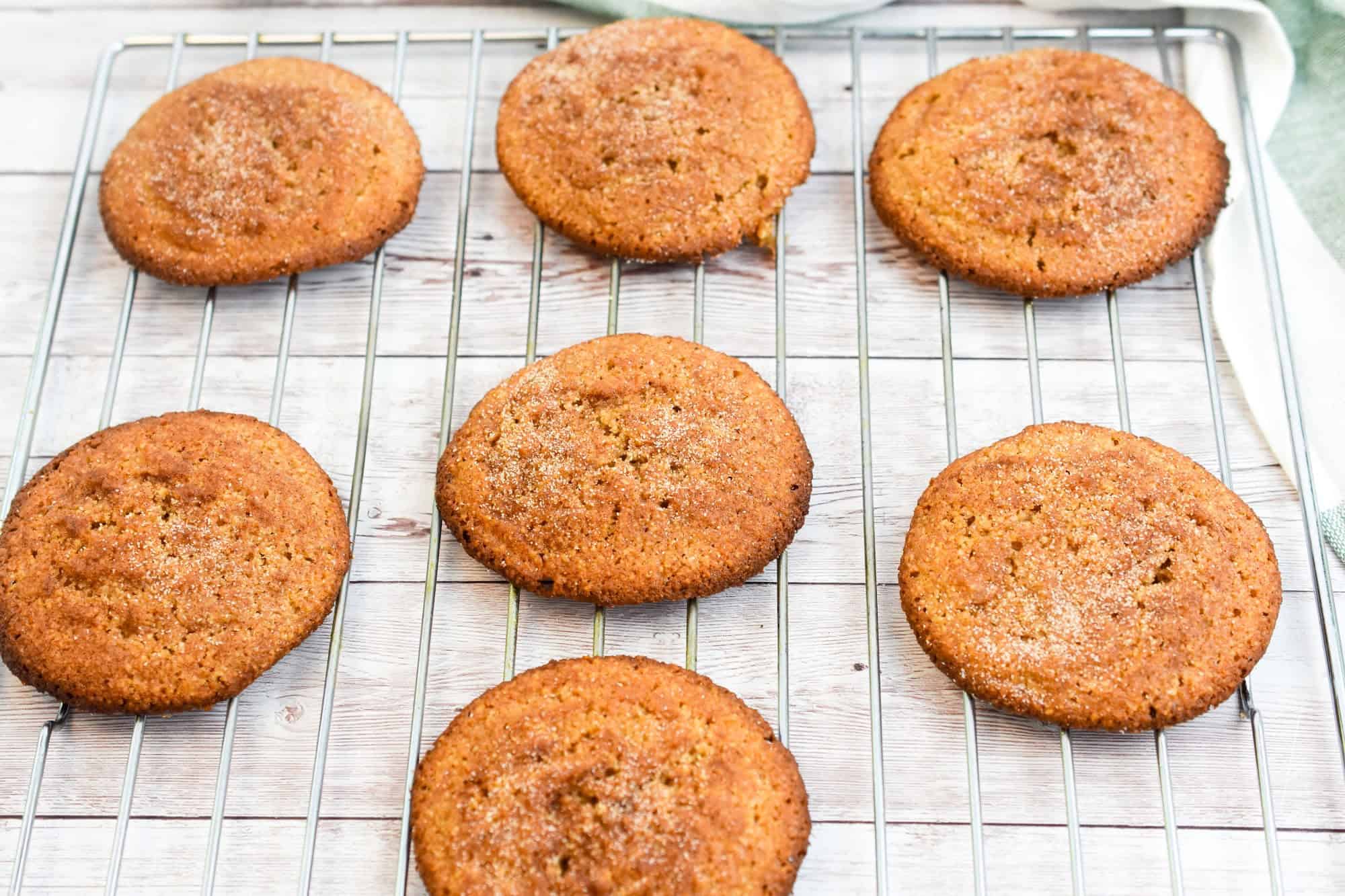 keto gingerdoodle cookies on a baking rack cooling