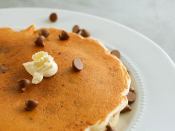 Keto Chocolate Chip Pancakes Served With a Pat of Butter
