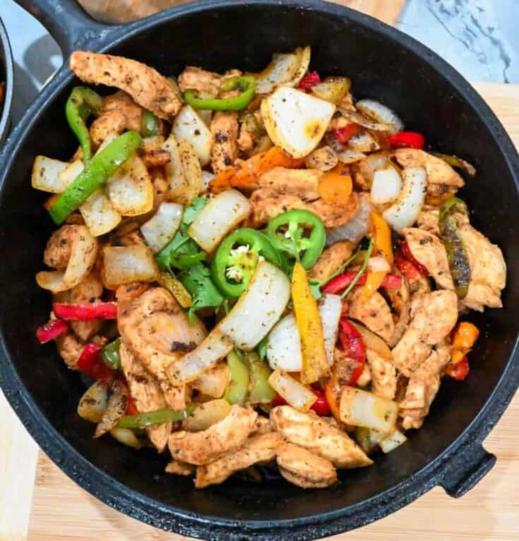 keto chicken fajitas in a black cast iron skillet