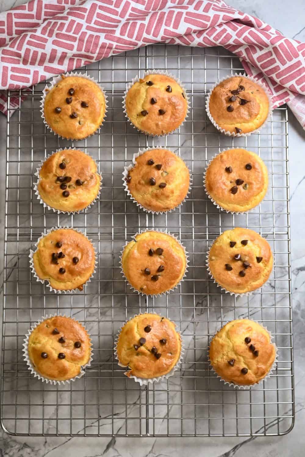 Easy Keto Chocolate Chip Muffins Cooling On A Baking Rack