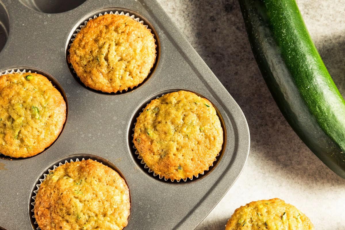 keto zucchini muffins in a muffin pan