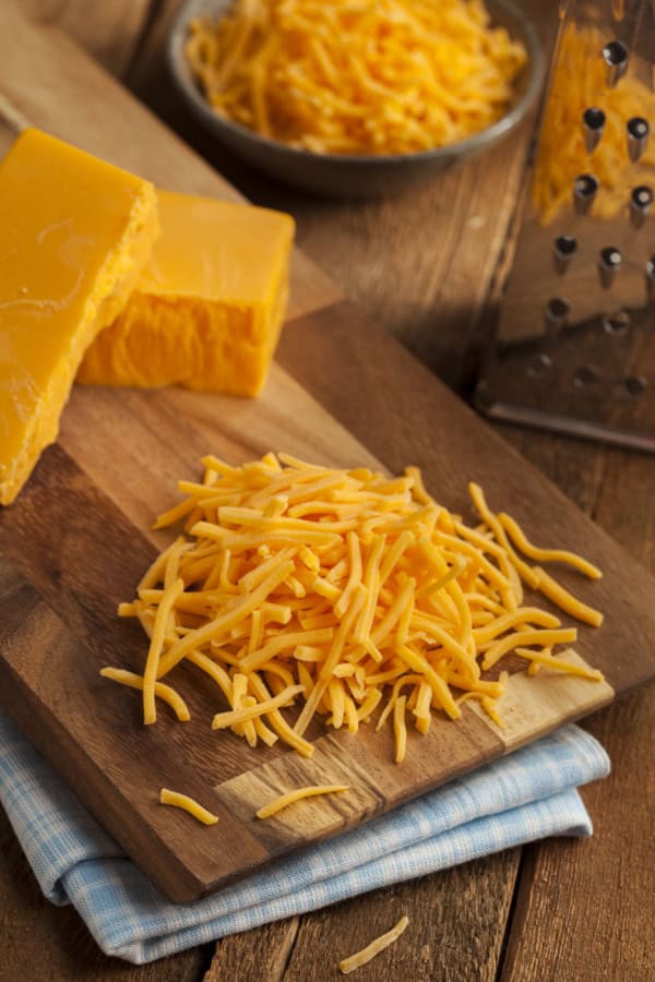 Cheese being shredded