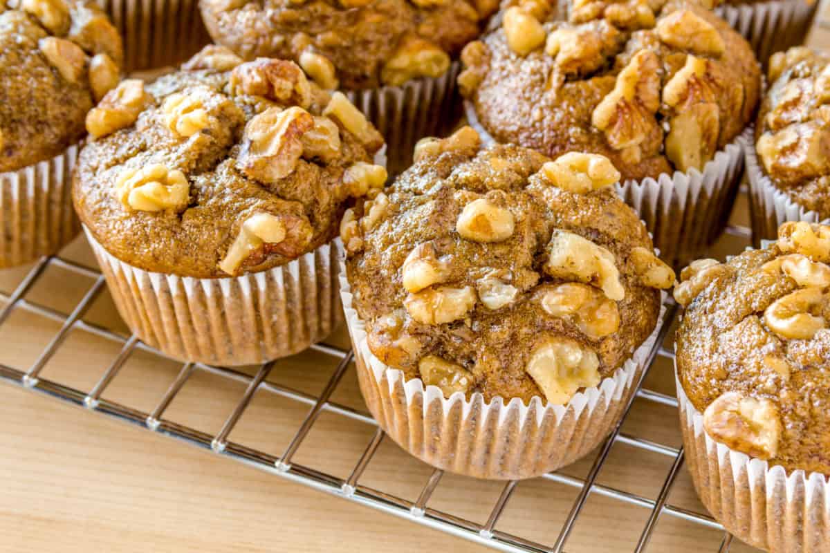 Keto banana nut muffins cooling on a baking rack