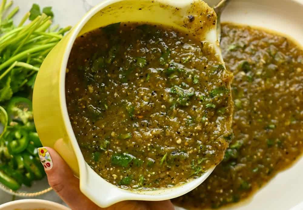 Low-Carb Green Enchilada Sauce Being Used