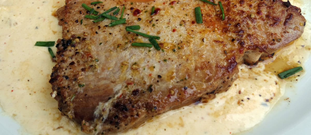 Steak Served with Carnivore Alfredo Sauce